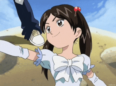 a girl in a white dress with a bow is being held up by someone