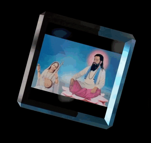 a cube with a picture of a man and a woman on it and the words good morning on the bottom