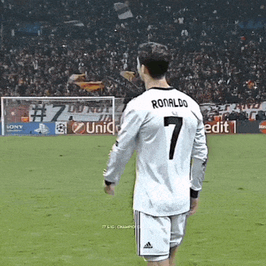 a soccer player named ronaldo wears a number 7 jersey