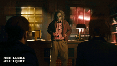 a poster for the movie beetlejuice shows a man standing in a room