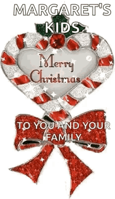 a candy cane heart with a bow and the words `` merry christmas to you and your family '' .