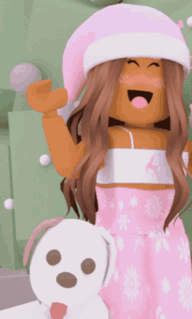 a girl wearing a pink hat is holding a stuffed dog