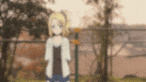 a blurry picture of a girl with blonde hair