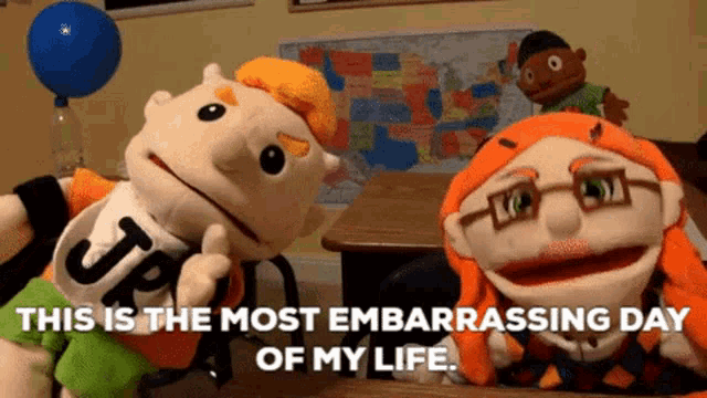 a couple of stuffed animals are sitting at a desk with the words " this is the most embarrassing day of my life "
