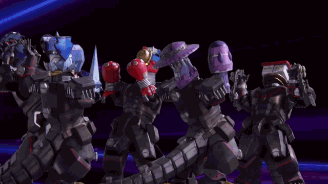 a group of robots are standing next to each other and one has a red glove on