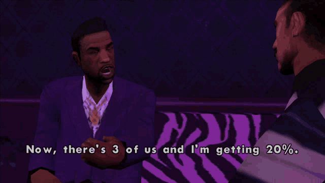 a man in a purple suit is talking to another man in a zebra print chair