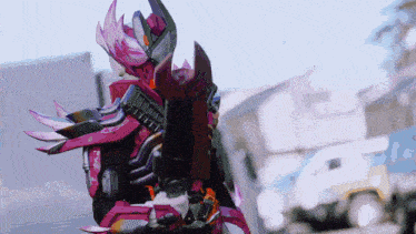 a person in a robot costume with a sword in their hand