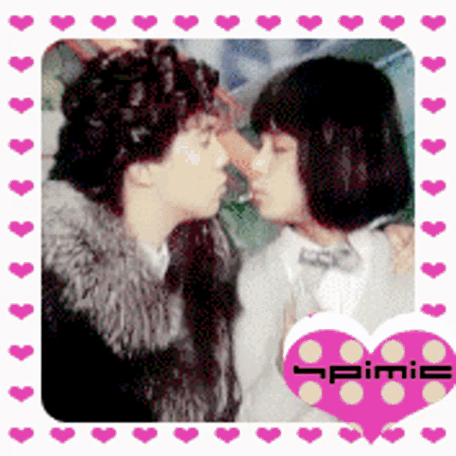 a picture of two people kissing with a heart that says pimic