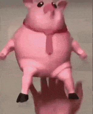 a pink pig wearing a red tie and black shoes is dancing