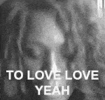a black and white photo of a woman with dreadlocks says `` to love love yeah '' .