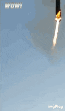 a rocket is flying through the air with the words wow on the bottom right