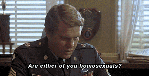 a man in a military uniform asks if he is homosexual