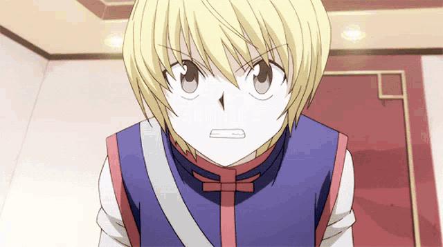 a cartoon character with blonde hair and a purple shirt