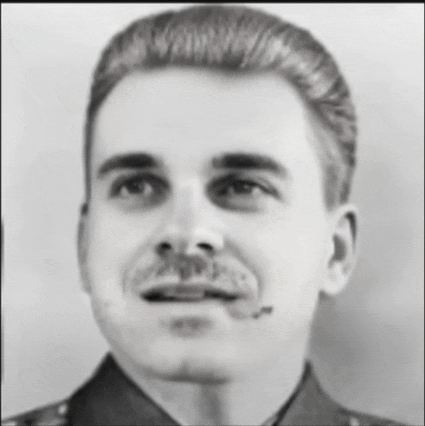 a man with a mustache is wearing a uniform