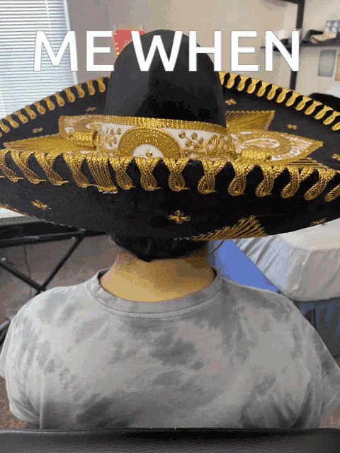 a person wearing a sombrero with the words me when written on it