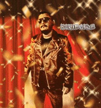 a man in a leather jacket stands in front of a red curtain with the word homecine written on it