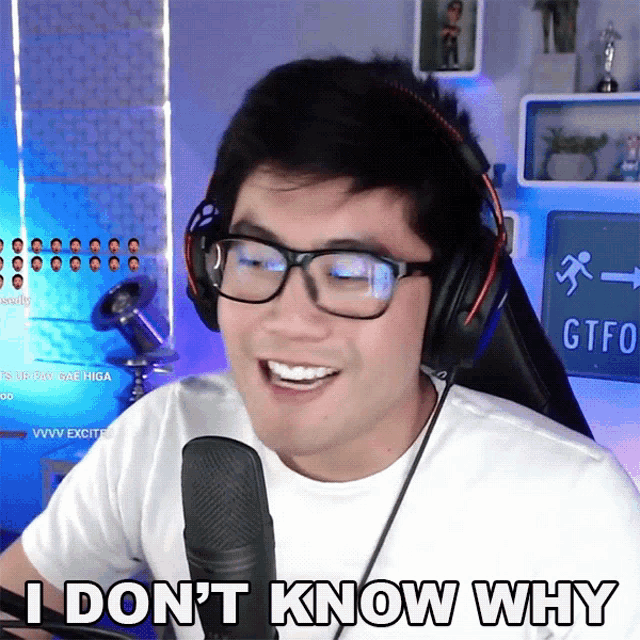 a man wearing glasses and headphones says " i don t know why "