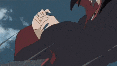 itachi uchiha from naruto is wearing a black and red hooded jacket .