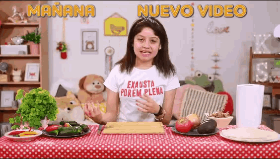 a woman in a t-shirt that says exhausta porem plena