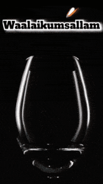 a glass with a candle in it and the words waalaikumsallam