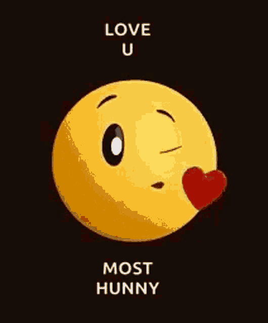 a smiley face is blowing a kiss with a red heart in its mouth and says `` love u most hunny '' .