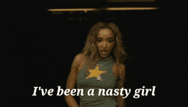a woman says i 've been a nasty girl while holding a piece of paper