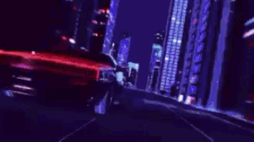 a computer generated image of a red and blue light beam coming out of a building .