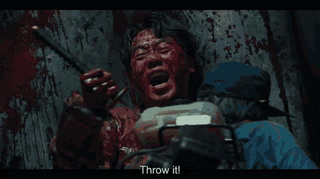 a man with blood on his face is being thrown in the air