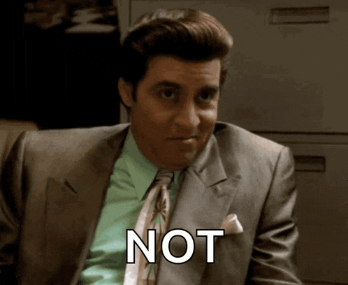 a man in a suit and tie has the word not written on his face