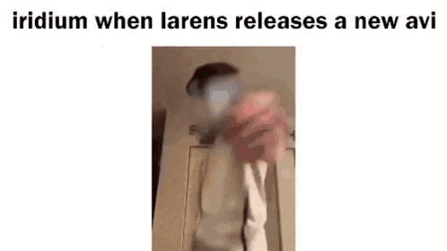 a man in a white shirt is standing in front of a door and a sign that says iridium when larens