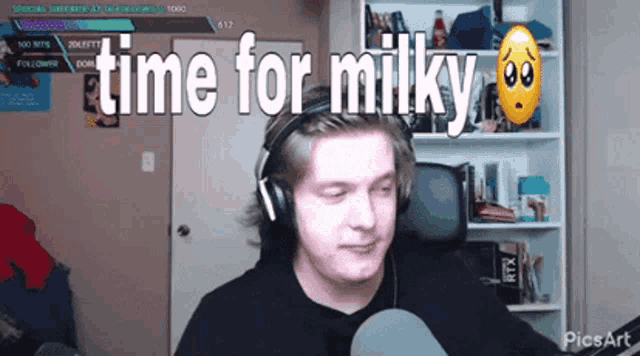 a man wearing headphones says " time for milky " in front of a microphone