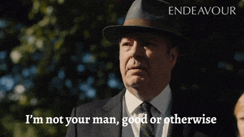 a man in a suit and hat says endeavour