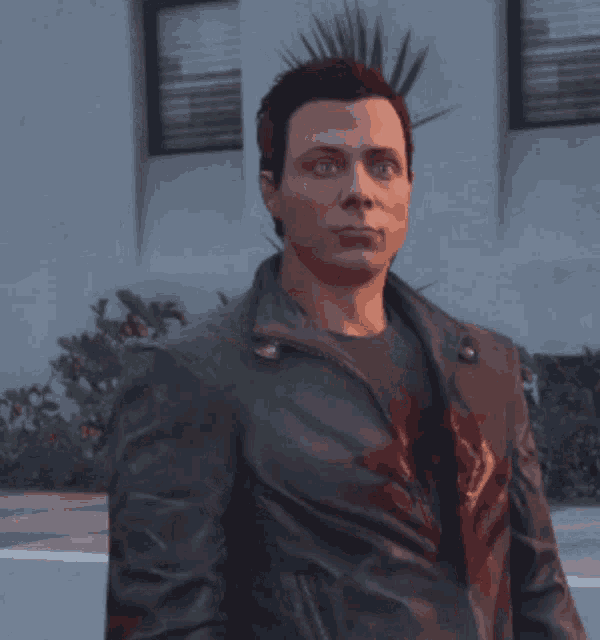 a man wearing a black leather jacket with blood on it