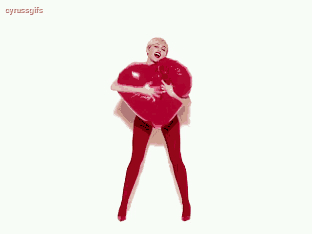 a gif of a woman in red tights and heels with the words cyrussgifs below her