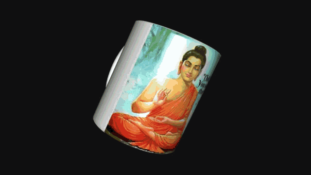 a mug with a painting of a buddha on it
