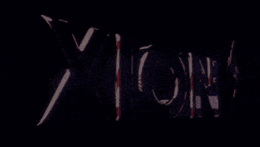 the word xion is on a dark background with a flame