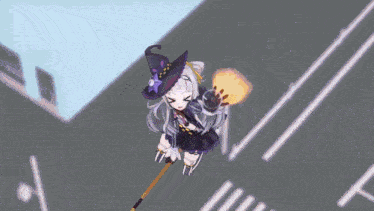 a little girl in a witch costume is flying through a circle .