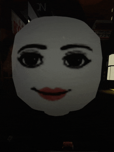a white face with black eyes and red lips in a dark room with a sign that says n on it