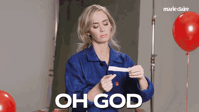a woman in a blue shirt is holding a piece of paper and the words oh god are above her