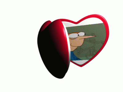 a heart shaped mirror with a picture of a cartoon character