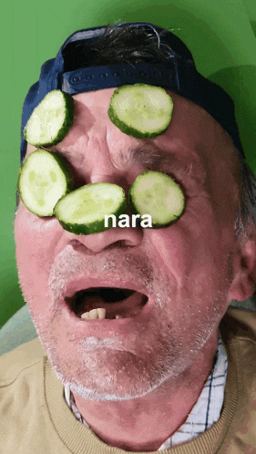 a man with cucumber slices on his face and the word nara on the bottom right