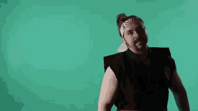 a man wearing a headband with a sun on it asks what