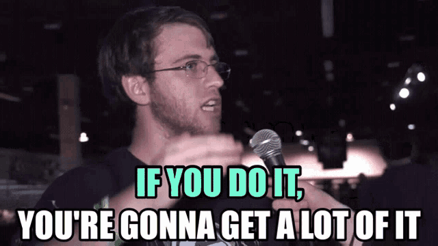 a man speaking into a microphone with the words " if you do it you 're gonna get a lot of it "