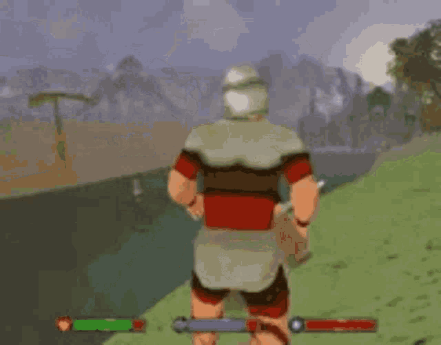 a man and a woman are standing next to each other in a video game with mountains in the background .
