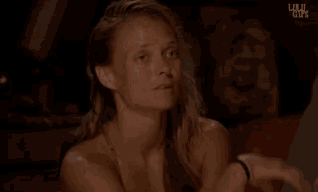 a woman covering her eyes with her hands and the words lil ' gifs on the bottom right
