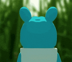 a blue teddy bear with a white shirt on