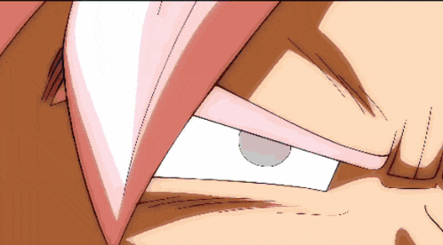 a close up of a cartoon character 's eyes with a white pupil