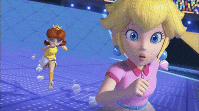 peach and daisy are playing a video game and peach looks surprised