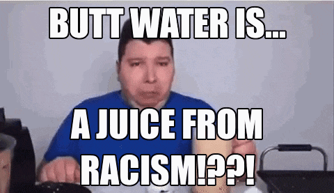 a man in a blue shirt says butt water is a juice from racism .