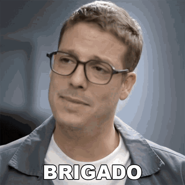 a man with glasses and the word brigado on his face